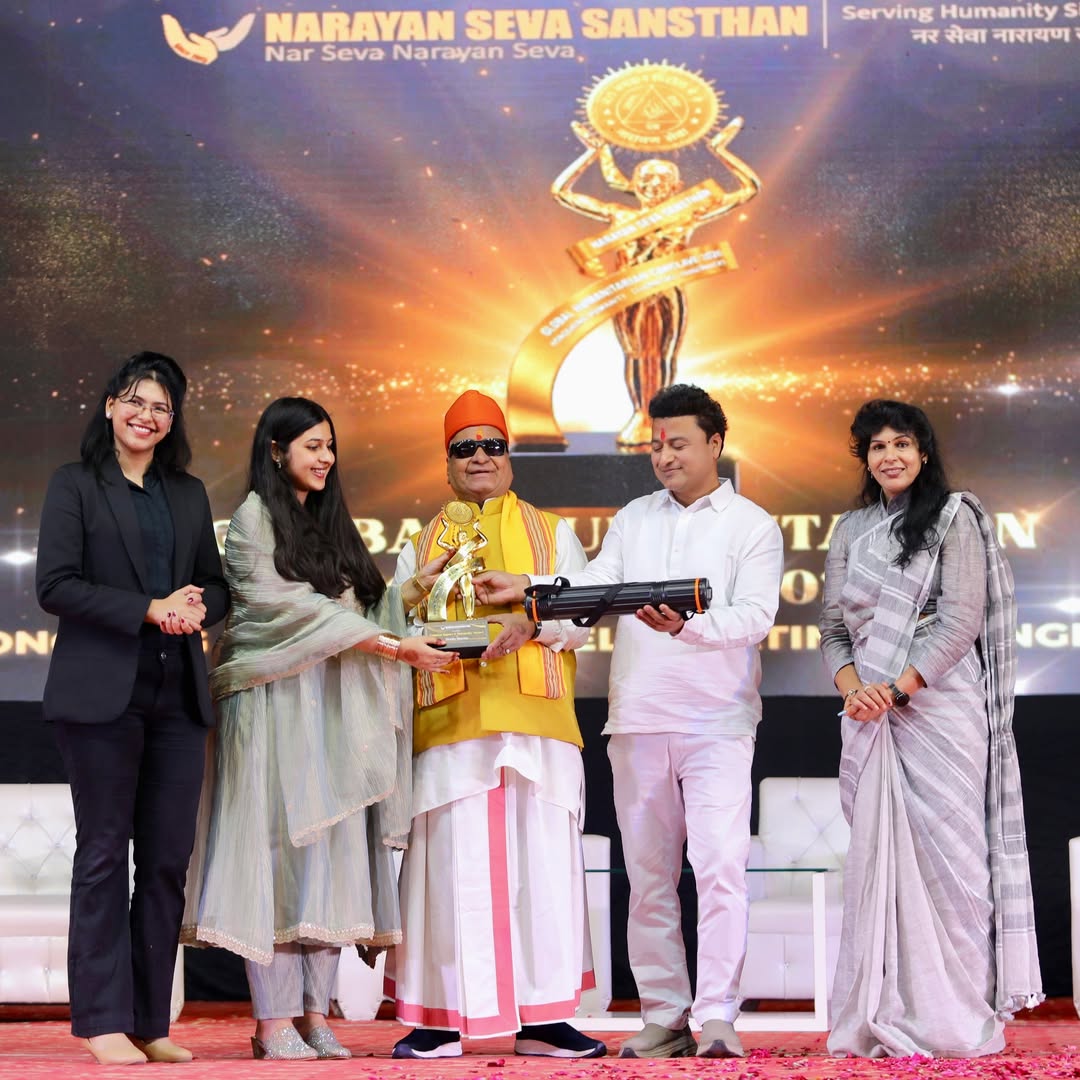 Shailja Sharma felicitated on stage at Narayan Seva Sansthan.